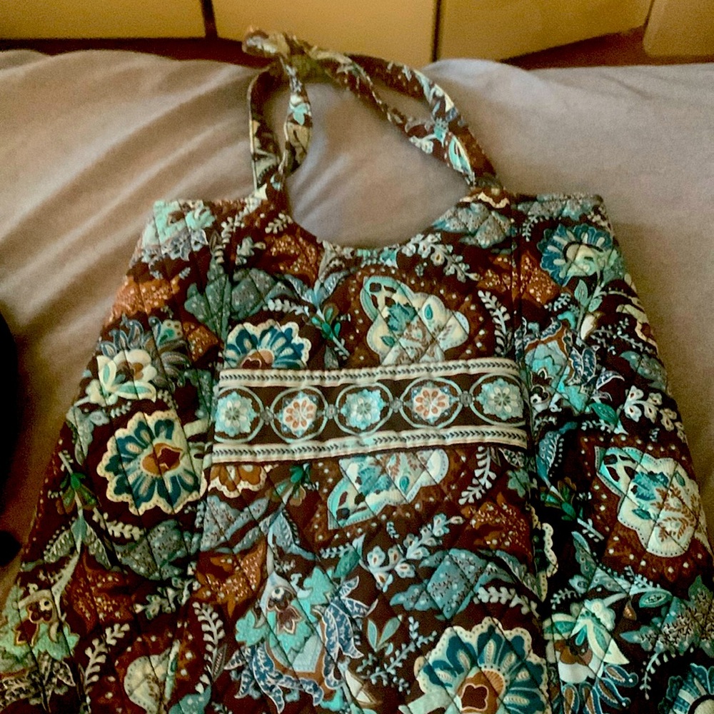 Four piece Vera Bradley set pocketbook, make-up bag, eye glass case, wallet